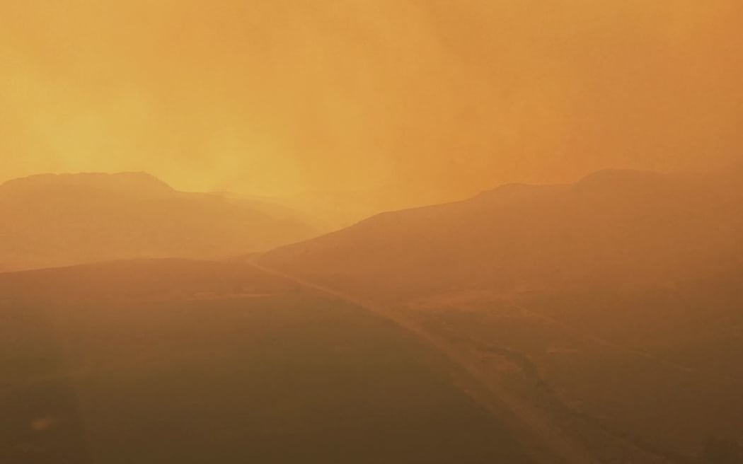 The "apocalyptic twilight" conditions firefighters are working in in British Colombia.