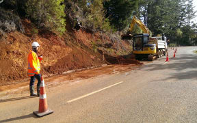 Work begins to clear a slip on Mangakahia Road in Northland.