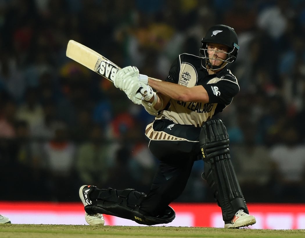 New Zealand's Mitchell Santner plays a shot during the World T20 match between India and New Zealand in Nagpur on 15 March 2016.