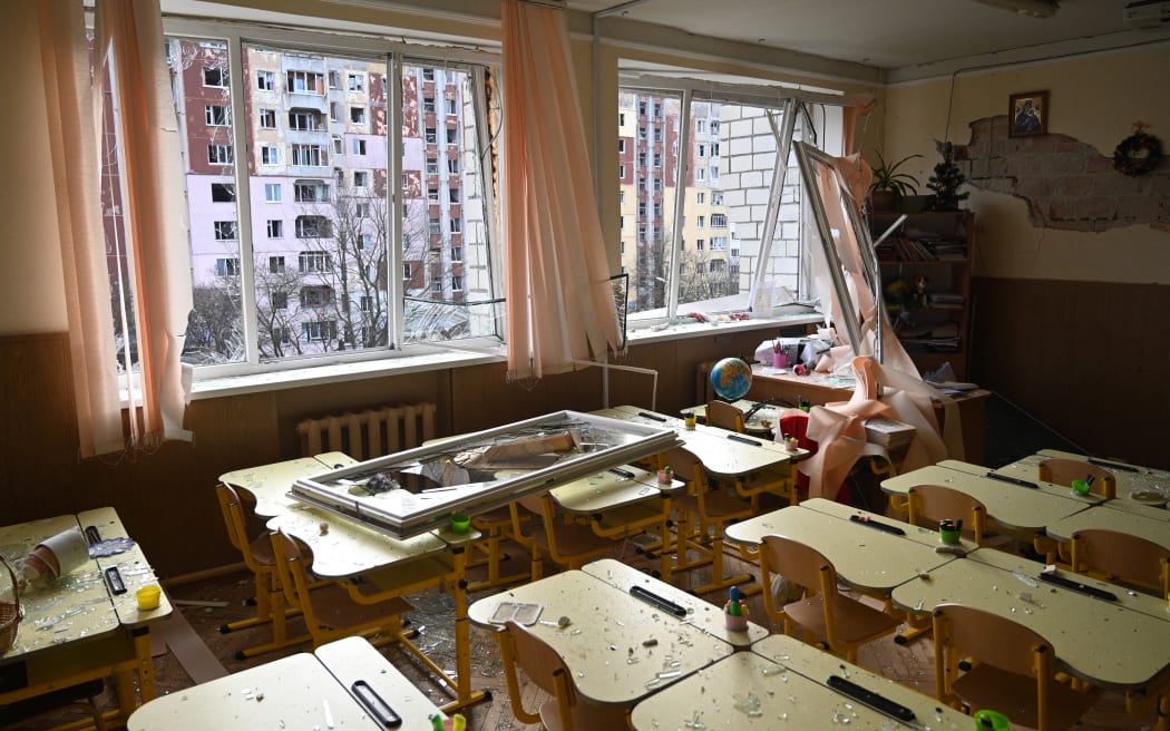 This photograph shows a school classroom damaged as a result of missile strike in the city of Lviv, western Ukraine on December 29, 2023, amid Russian invasion of Ukraine. Russia launched drone and missile strikes across Ukraine on December 29, 2023, killing at least 18 people and wounding over a hundred in one of the most massive air attacks of the war. (Photo by YURIY DYACHYSHYN / AFP)