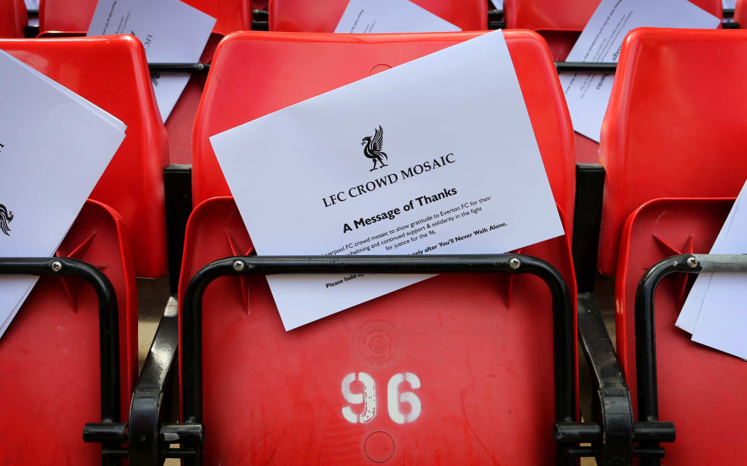 A white card forms part of a message of thanks to the Everton fans for their part in the Hillsborough campaign. Liverpool, 2013.