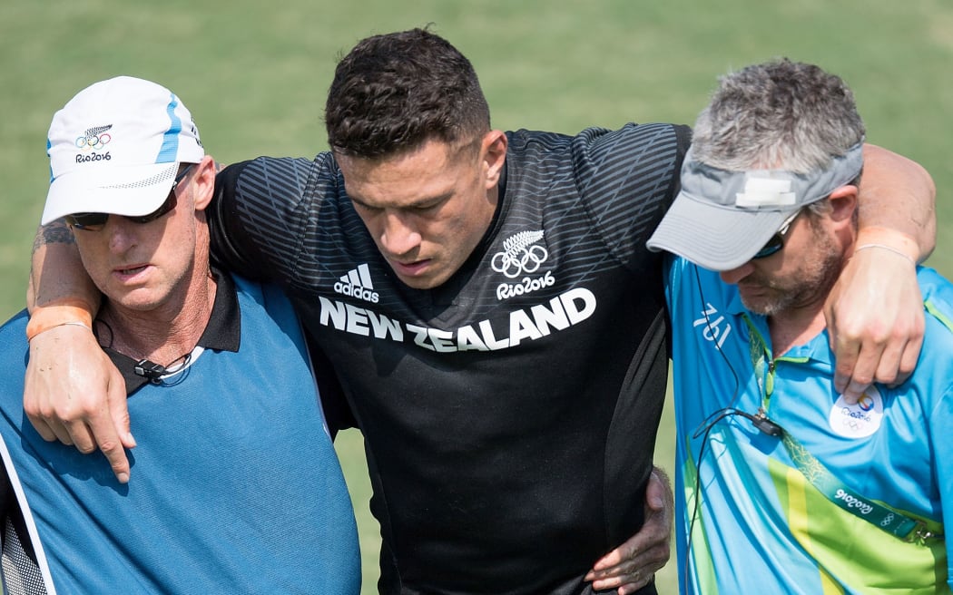 Sonny Bill Williams leaves the field injured at the Rio Olympics.