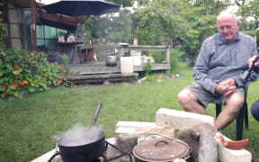 Kaikoura man Gary Melville had no power, so he cooked his lamb roast outside.