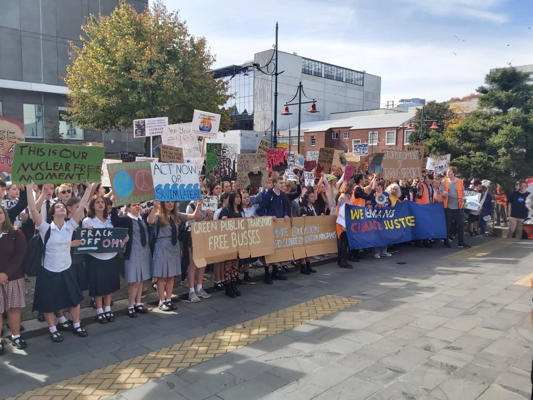 Protesters outside the council building in Christchurch chant "Mayor Dalziel" and "where's our mayor?" Councillors attempted to speak, but were drowned out by the crowd calling for the mayor.