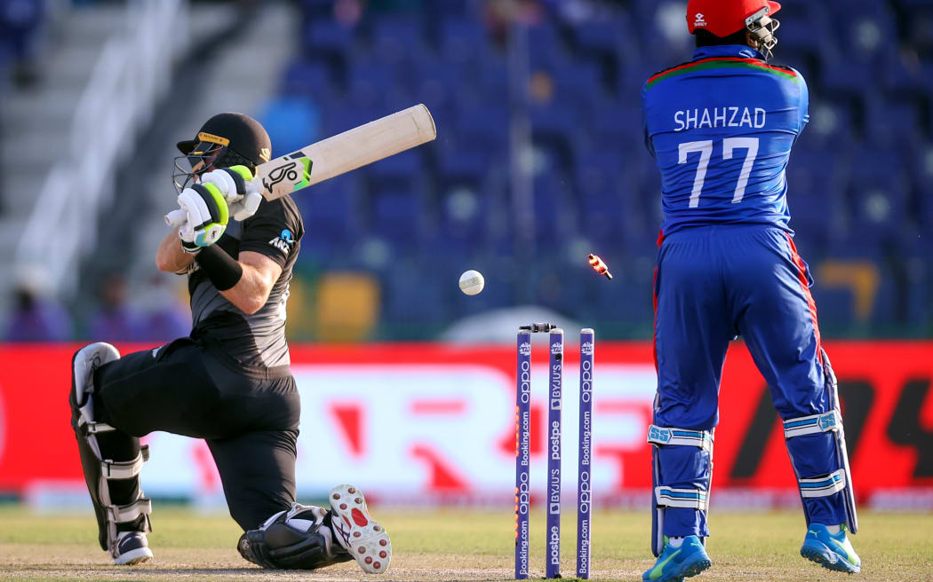 Black Caps batter Martin Guptill is bowled by Rashid Khan of Afghanistan during their 2021 T20 World Cup  match in Abu Dhabi.