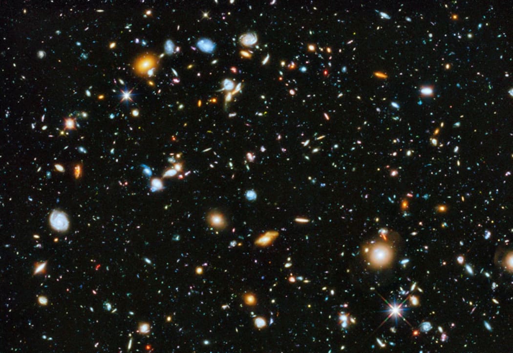This Hubble image captures galaxies as far back as 400 million years after the Big Bang. James Webb will go back even further in time.