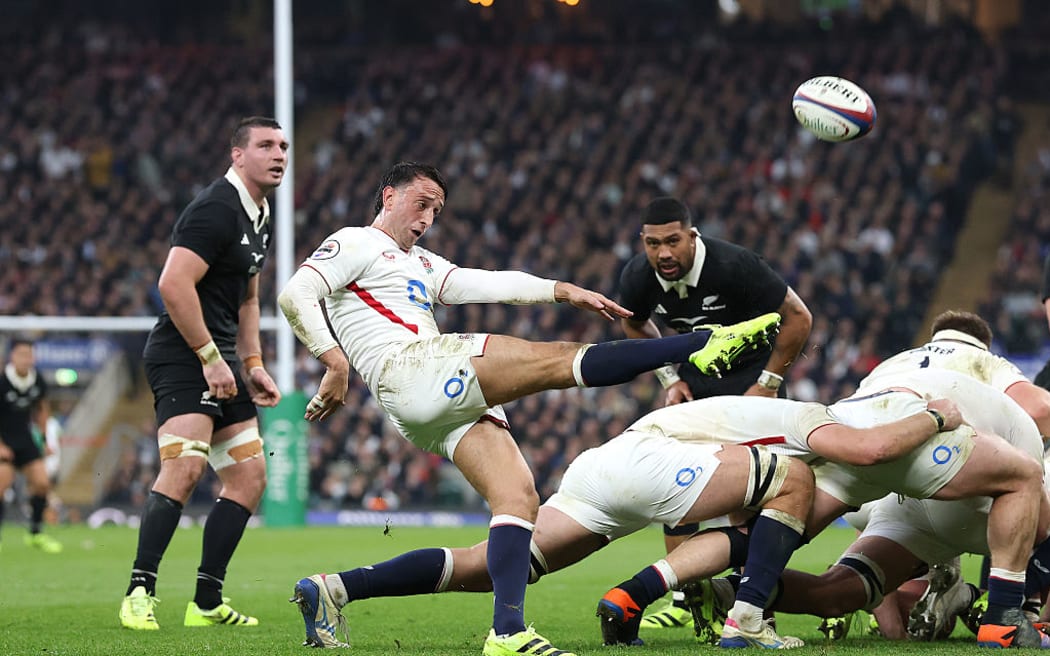 English halfback Alex Mitchell.