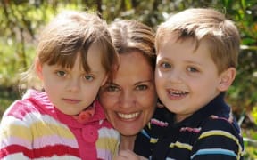 Maria Claudia Lutz with her children Elisa and Martin.