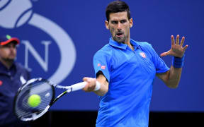 World number one Novak Djokovic is through to the semi-finals.