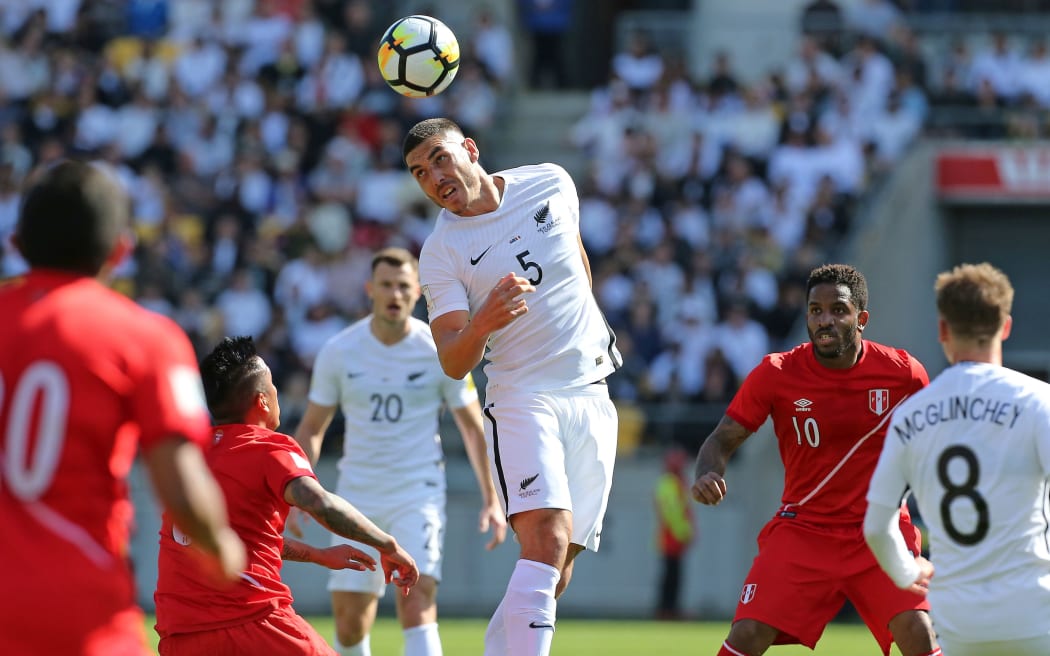 Michael Boxall takes a header for the All Whites.