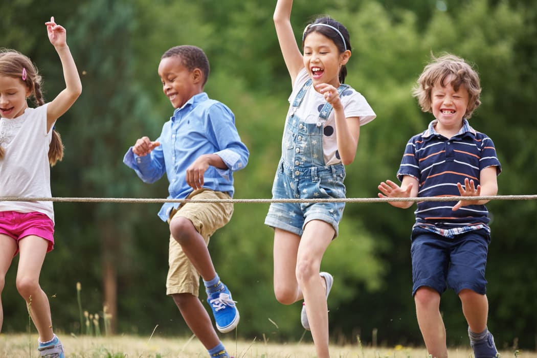 48658696 - A photo of children arriving to the finish line at race at a birthday party