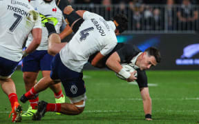 Will Jordan of New Zealand tackled by Hugo Auradou of France, New Zealand All Blacks v France.