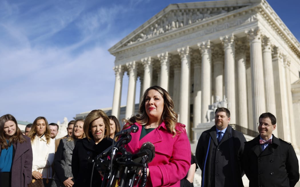 WASHINGTON, DC - DECEMBER 05: Lorie Smith, the owner of 303 Creative, a website design company in Colorado, speaks to reporters outside of the U.S. Supreme Court Building on December 05, 2022 in Washington, DC. The U.S. Supreme Court heard oral arguments from cases including one involving Smith, who refuses to create websites for same-sex weddings despite a state anti-discrimination law.   Anna Moneymaker/Getty Images/AFP (Photo by Anna Moneymaker / GETTY IMAGES NORTH AMERICA / Getty Images via AFP)