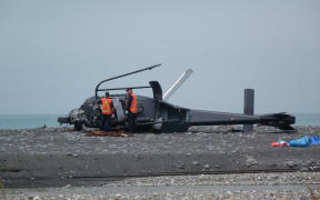 Inspectors at the crash site in Kekerengu.