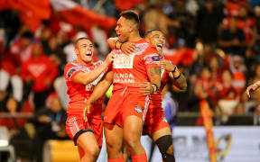 Tonga celebrate a try by Junior Tatola (c) during their 2018 Pacific Test Invitational win over Toa Samoa.