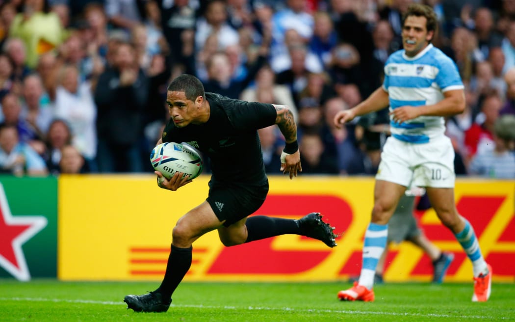 All Black halfback Aaron Smith goes over to score his try during the 2015 Rugby World Cup match between New Zealand and Argentina.
