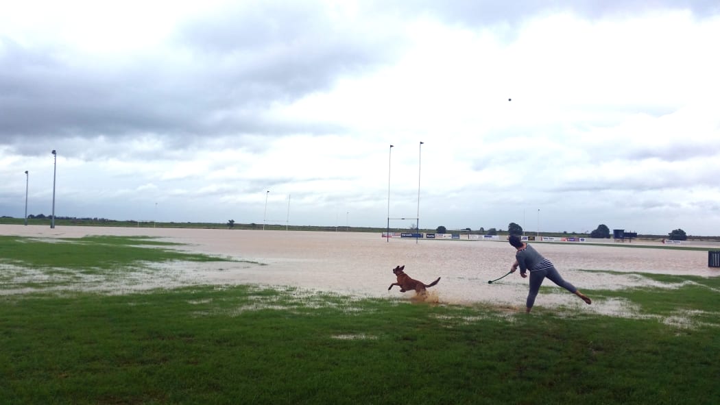The Rhodes Park in Kopu is flooded but some are still finding ways to have fun.
