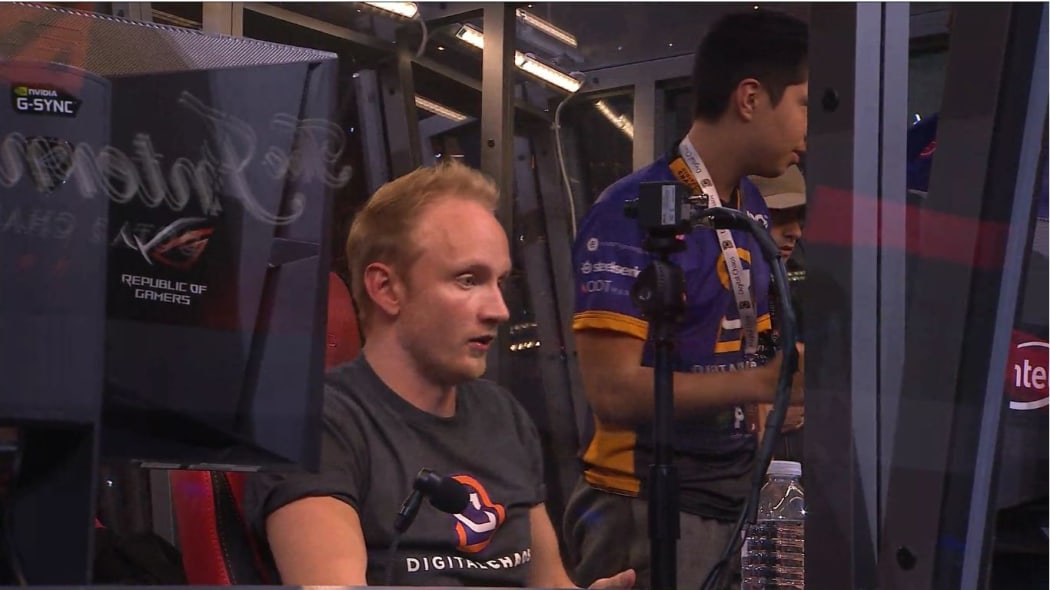Digital Chaos captain Rasmus "MiSeRy" Filipsen of Denmark considers the team's loss. Syrian-Romanian mid player Aliwi "W33" Omar looks on in the background.