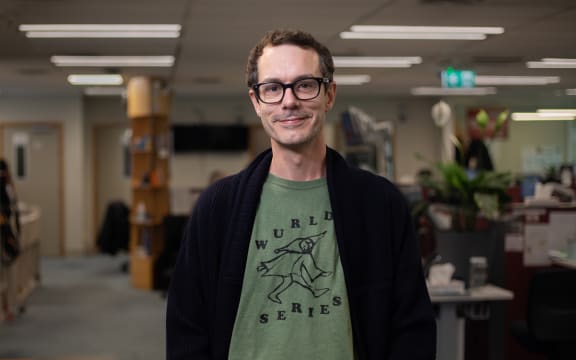 Tony Stamp wearing a 'Wurld Series' tee for NZ Music T-Shirt Day as part of New Zealand Music Month.