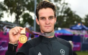 New Zealand's Samuel Gaze with his gold medal for mountain biking.