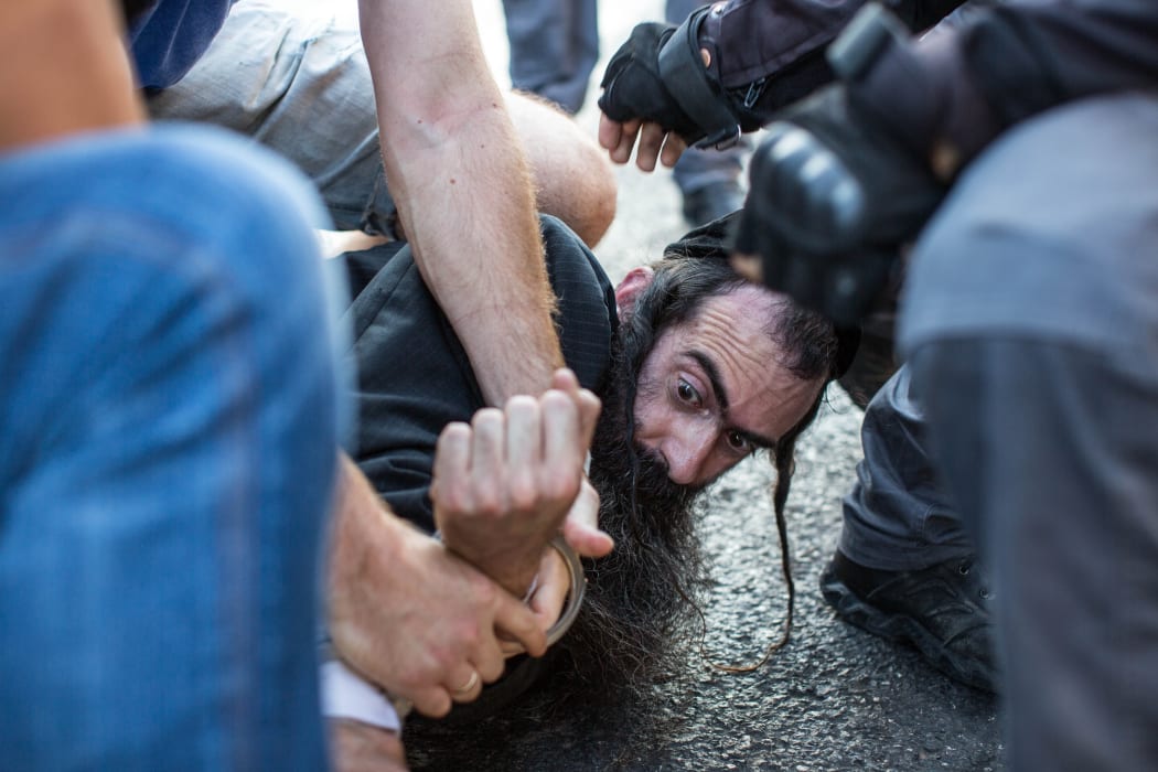 The suspect, Yishai Schlissel, is the same man who stabbed three people at the parade in 2005