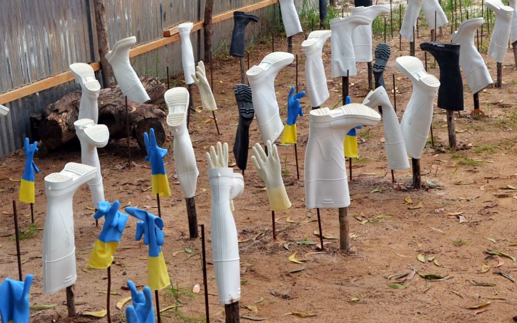 Protective gear including boots and gloves drying outside a hospital in the Liberian capital Monrovia.