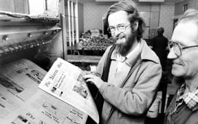 Akaroa Mail editor Michael de Hamel checking a copy of the Akaroa Mail when he took over 41 years ago.