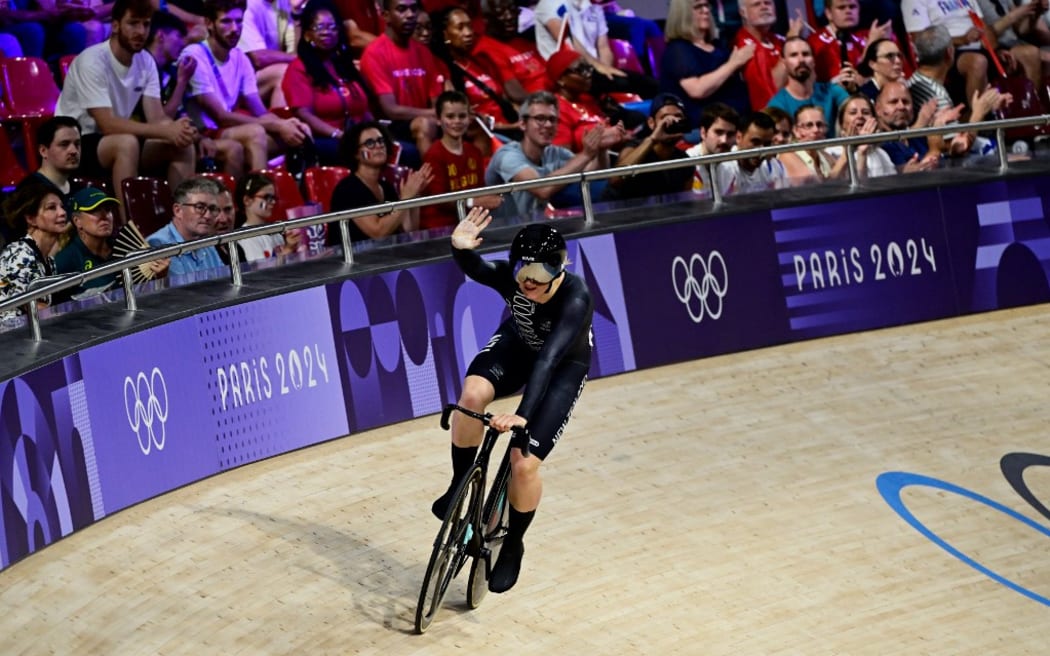 New Zealand's Ellesse Andrews reacts after a women's track cycling sprint 1/8 final of the Paris 2024 Olympic Games at the Saint-Quentin-en-Yvelines National Velodrome in Montigny-le-Bretonneux, south-west of Paris, on August 10, 2024. (Photo by John MACDOUGALL / AFP)