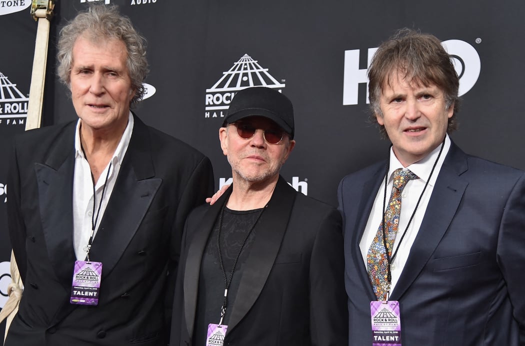 CLEVELAND, OH - APRIL 14: (L-R) Inductees John Illsley, Alan Clark and Guy Fletcher of Dire Straits attend the 33rd Annual Rock & Roll Hall of Fame Induction Ceremony at Public Auditorium on April 14, 2018 in Cleveland, Ohio.