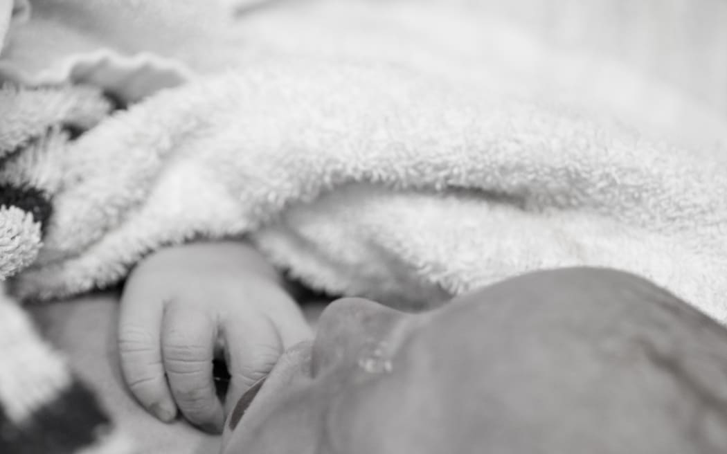The images can be confronting but Nicola Devine's own research shows photography can help the grieving process.