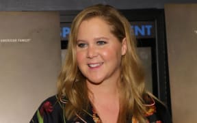 Amy Schumer attends as A24 and the Cinema Society host a screening of "The Humans" at Village East Cinema on November 18, 2021 in New York City.