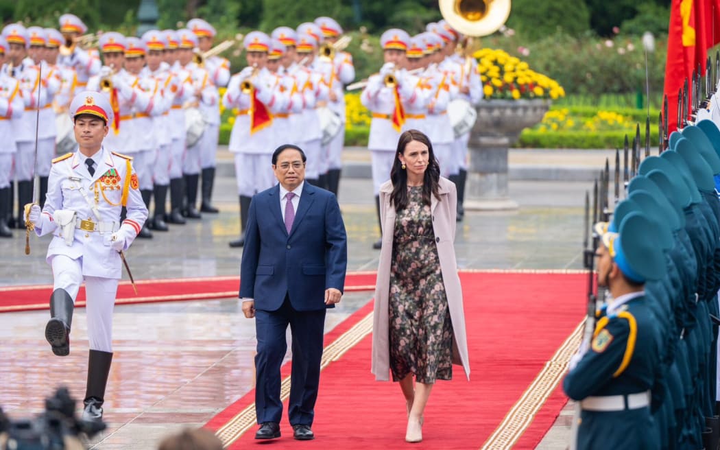 New Zealand Prime Minister Jacinda Ardern with Vietnamese Prime Minister Pham Minh Chinh on the red carpet at a full ceremonial welcome in Hanoi at the start of her two day visit.