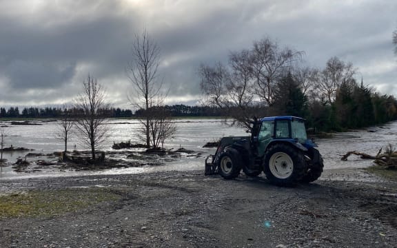 Laurence Rooney's tractor on the waterlogged farm.