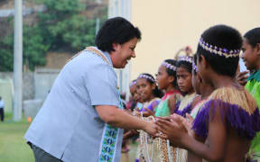 Paula Bennett speaks to children during ceremonies in the Solomon Islands to mark the end of the RAMSI mission.