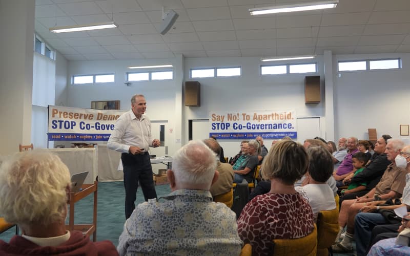 Julian Batchelor addresses mtg in Kerikeri
