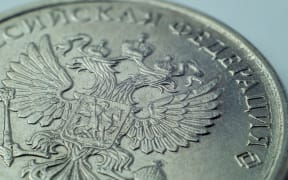 One Russian Ruble coin with double eagle.