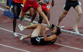 George Beamish gets a rival's shoe on his face after falling in at a heat of the men's 3000m steeplechase at the Athletics World Championships in Tokyo, 13 September, 2025. (Handout image supplied by Athletics New Zealand)