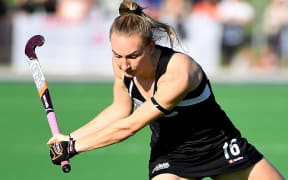 The Black Sticks player Liz Thompson in action.