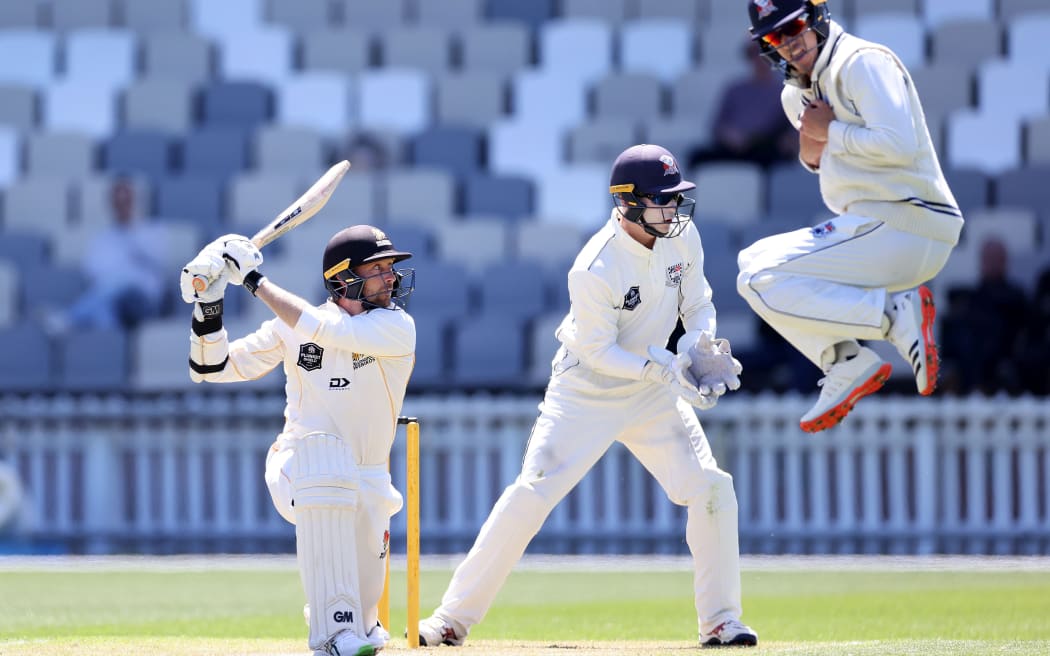 Devon Conway slashes through point against Auckland.