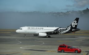 An Air New Zealand plane at Wellington Airport as fog causes delays and cancellations.