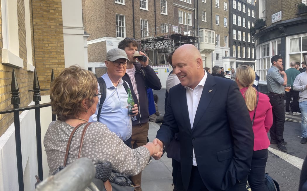 National Party supporters visiting London for the coronation join party leader Christopher Luxon for a pint at a Westminster pub.