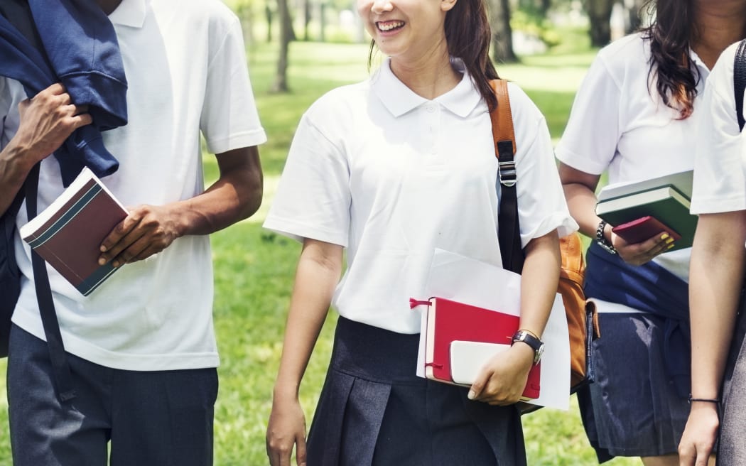 High school students on their way home, teenagers.