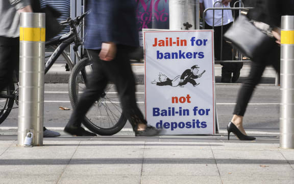 A photo taken in Melbourne on April 23, 2018 show a placard outside the royal commission set up in February to investigate misconduct in the banking sector.