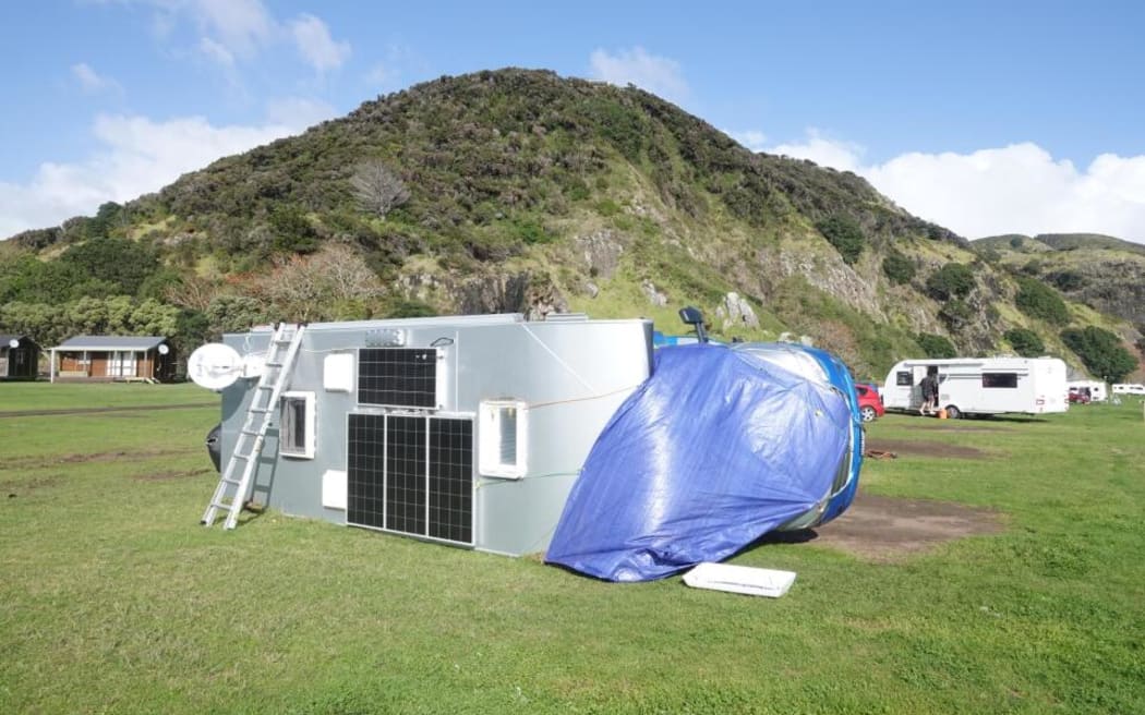 A man in his mid 80s was taken to hospital after being trapped in his campervan when it was blown over in Tauranga Bay Holiday Park, Northland, 15 July 2025.
