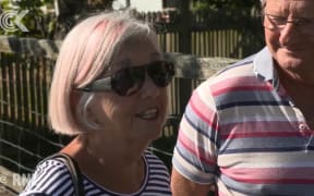 Evacuees pack precious belongings before leaving their homes