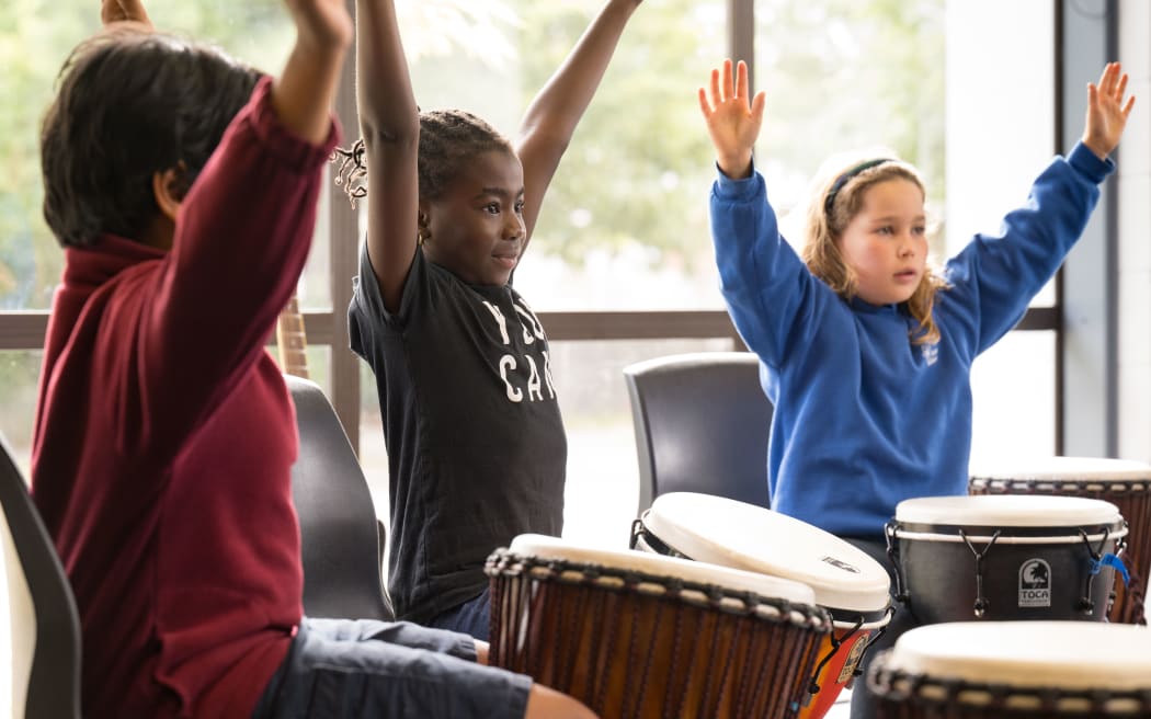 Children engaged in music therapy