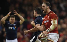 Wales wing George North celebrates a try in the Six Nations match against Scotland at the Principality Stadium in Cardiff, south Wales, on February 13, 2016