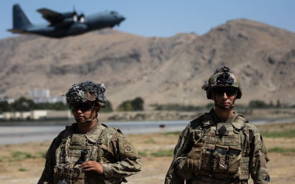 U.S soldiers from the XVIII Airborne Corps in  position guarding the at Hamid Karzai International Airport in Kabul, Afghanistan, on Aug 27, 2021.