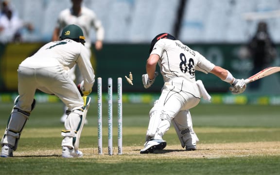 Henry Nicholls is stumped by Tim  Paine at the MCG.