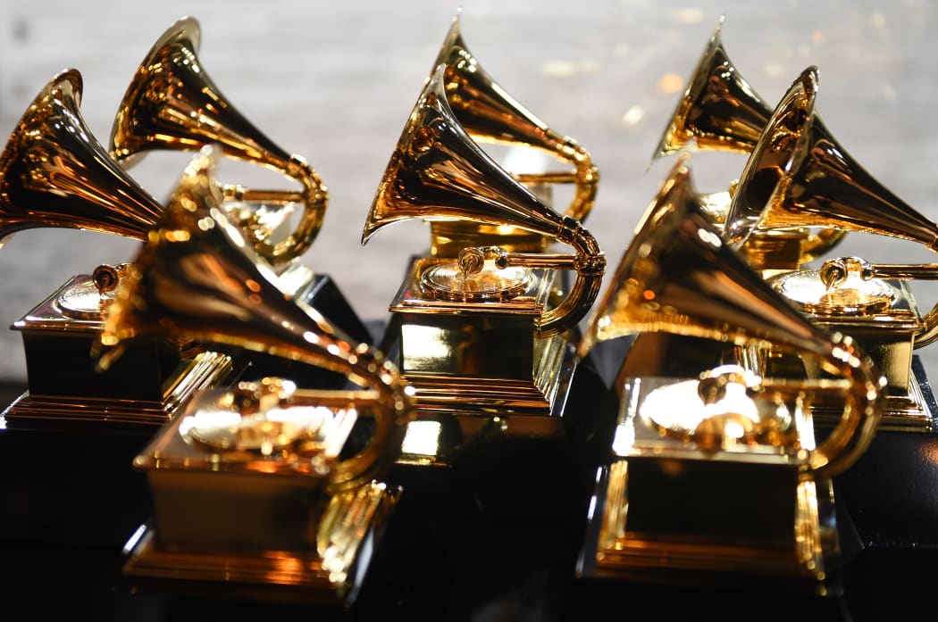 In this file photo taken on 28 January 2018, Grammy trophies sit in the press room during the 60th Annual Grammy Awards in New York.